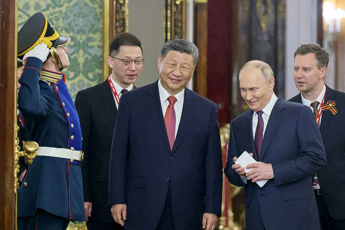 'Friends of steel': Xi and Putin pledge  to stand together against United States